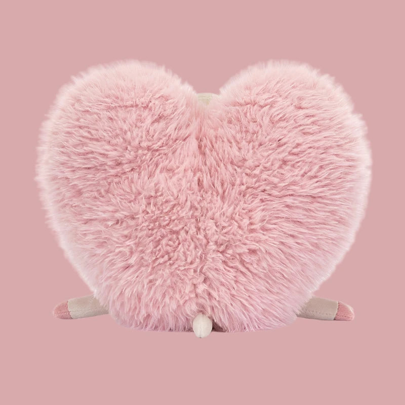 Baa-rilliantly adorable and ready to spread some love, the Jellycat Aimee Love Heart Sheep is here to make hearts flutter! This pink, plushy sheep is not only fabulously fluffy but also features a cute love-heart design, making her the perfect cuddle buddy for all ages. Soft, sweet, and oh-so-huggable, she’s the ideal companion for cozy moments and heartfelt gifts.