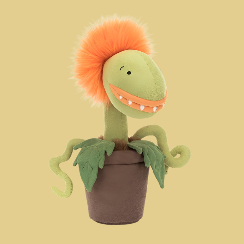 Jellycat Carniflore Tammie – The Most Adorably Cheeky Plant!

Say hello to Carniflore Tammie, the most mischievous (and cuddly) little plant from Jellycat! With her playful Venus flytrap-inspired design, fuzzy green leaves, and a soft, velvety pot, Tammy is equal parts cute and quirky. No need to worry—this plush plant won’t bite, but she’s sure to bring smiles with her big grin and cheeky personality!

