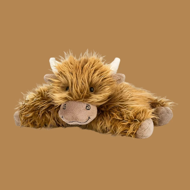 Meet Truffles, the Highland Cow with a hairstyle that’s udderly fabulous! This medium-sized, shaggy pal is the perfect blend of cozy and quirky, with his tousled “fringe,” soft plushy body, and irresistible charm. Whether he’s lounging on your couch or tagging along on adventures, Truffles is ready to bring a whole lot of personality and fluff to your life. He’s more than just a plushie – he’s a moo-d!
