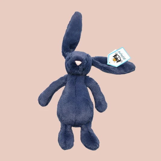 Looking for the cutest cuddle buddy? The navy Jellycat is here to steal your heart! This plushie isn’t just soft, it's squishy, huggable, and oh-so-irresistible. From its velvety fur to its adorable floppy ears, this Jellycat is the perfect snuggle pal for kids and grown-ups alike!